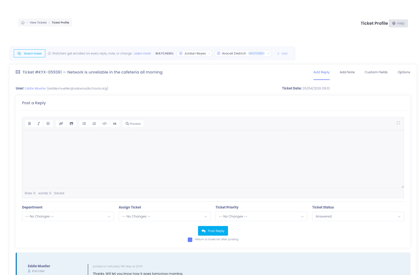 Ticket detail view with reply composer, department/assignment fields, and watchers